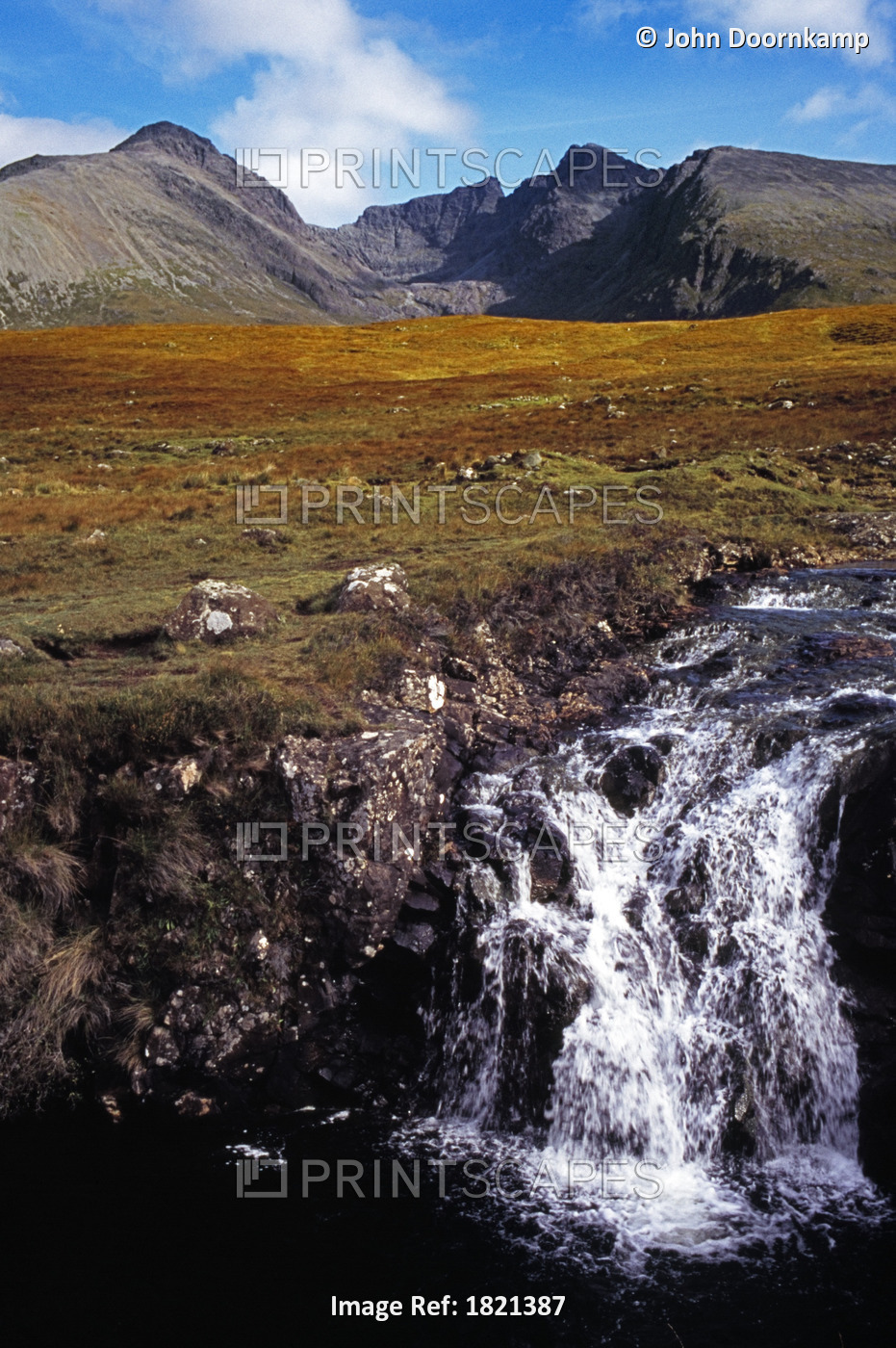 FIELD AND WATERFALL IN THE HIGHLANDS, SCOTLAND
