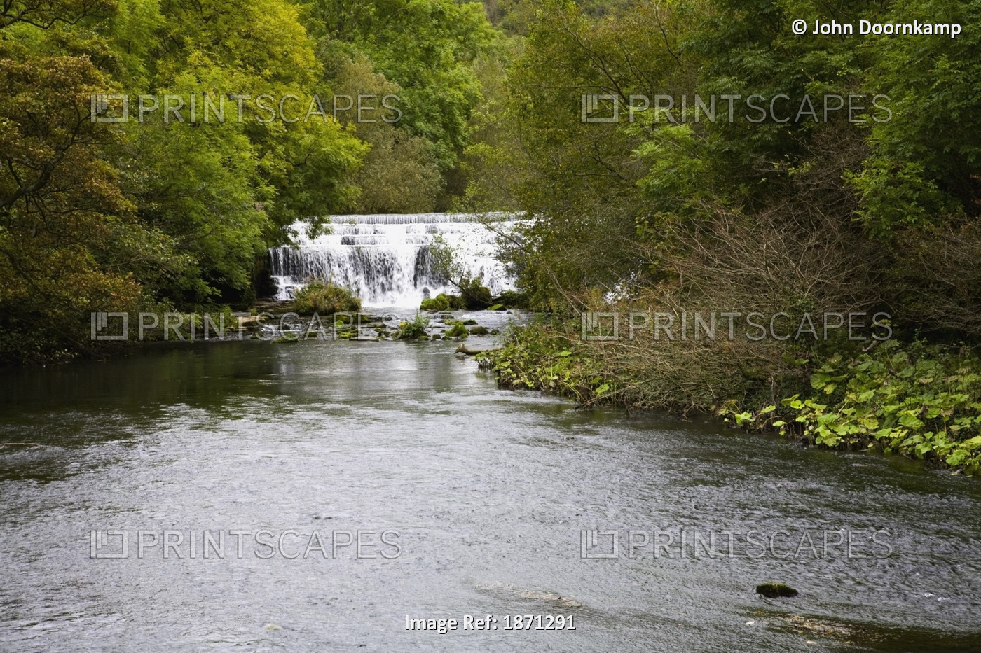 Derbyshire, England; A Waterfall on The River Wye, Monsal Dale, England.