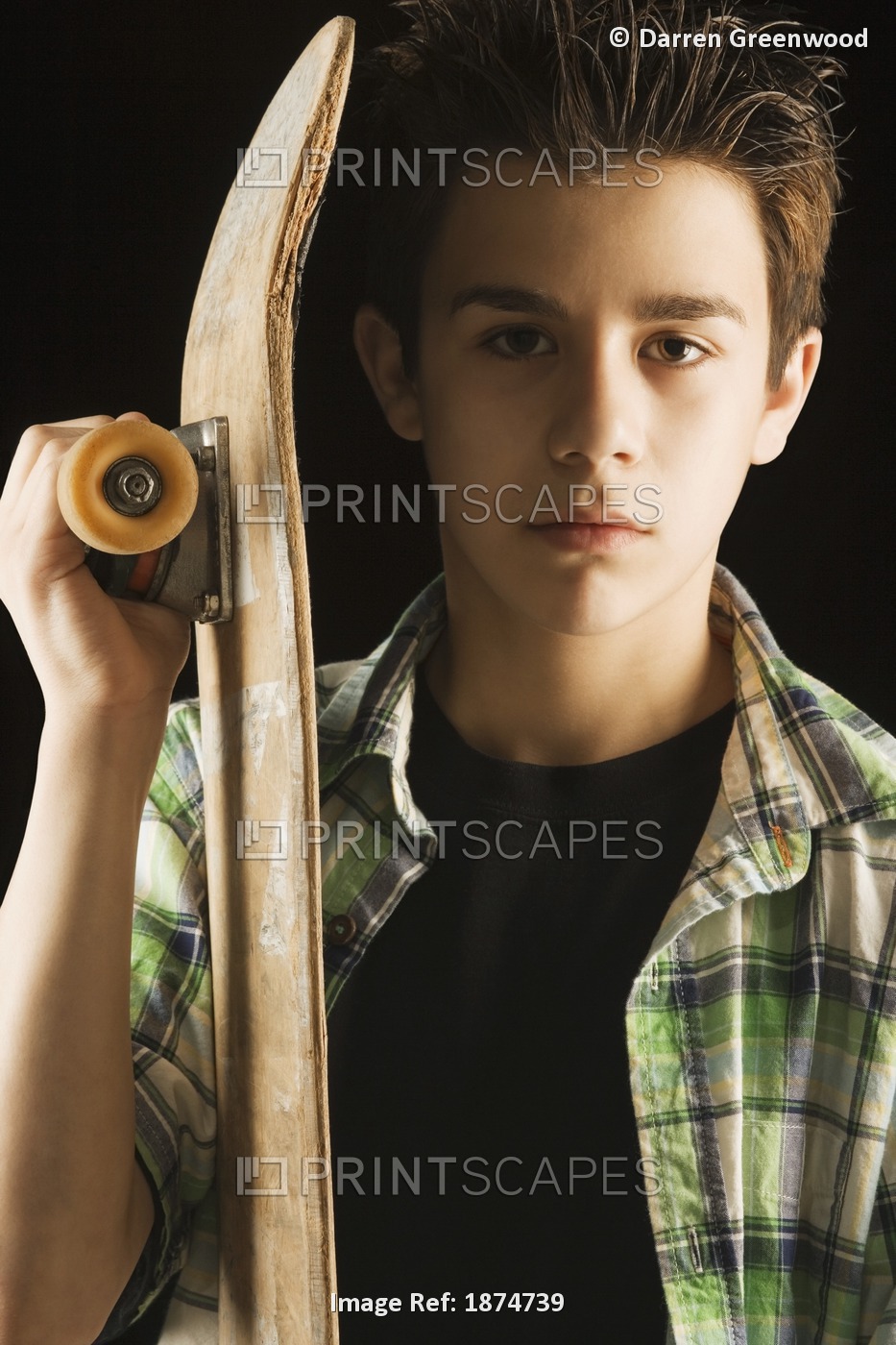 A Boy With A Skateboard