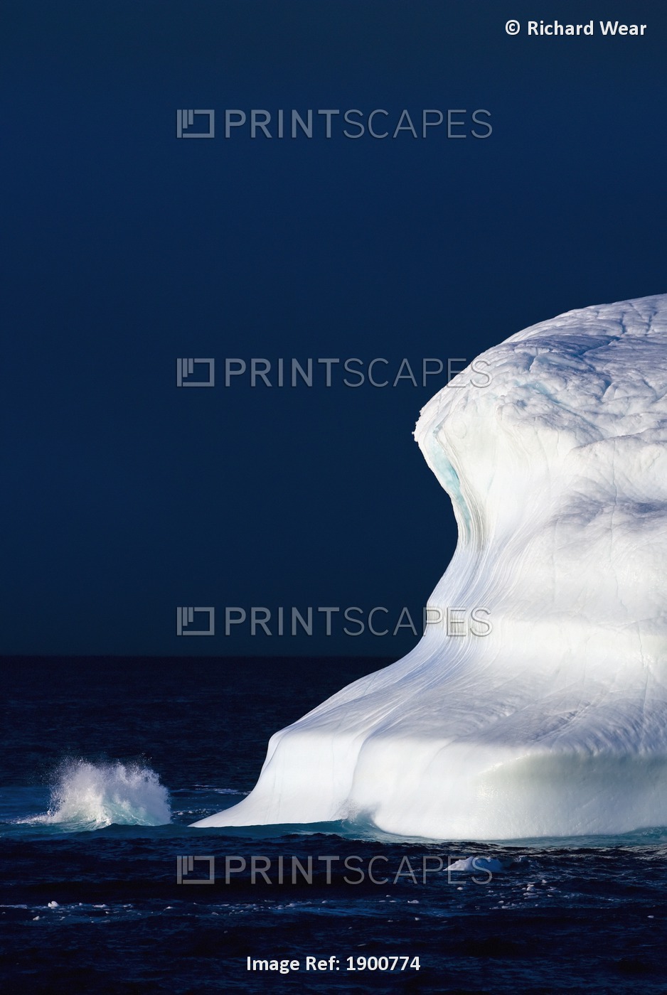 Ocean Water Splashing Against An Iceberg In The High Arctic Waters; Nunavut, ...