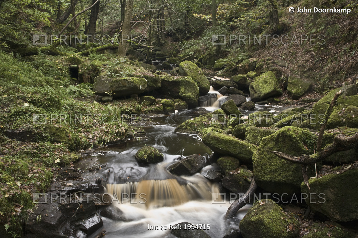 Water Flowing Over Rocks In Peak District National Park; Derbyshire England