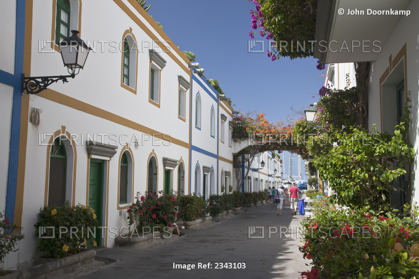 Residential Buildings Along A Street; Puerto Morgan, Gran Canaria, Spain