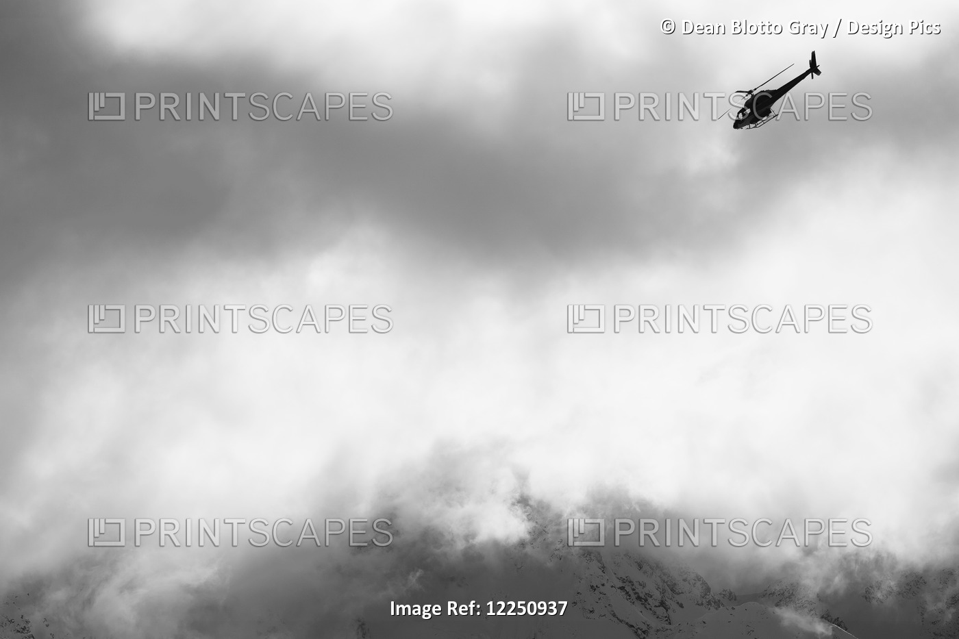 Heli Ski Helicopter Flying Amongst Fog And Clouds, New Zealand