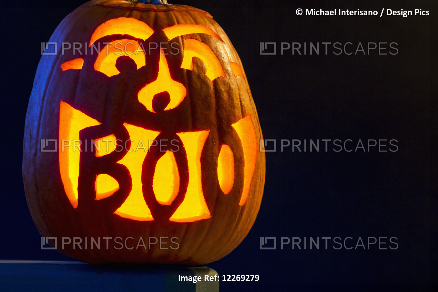 Carved Pumpkin Glowing With The Word Boo Carved In Mouth; Calgary, Alberta, ...