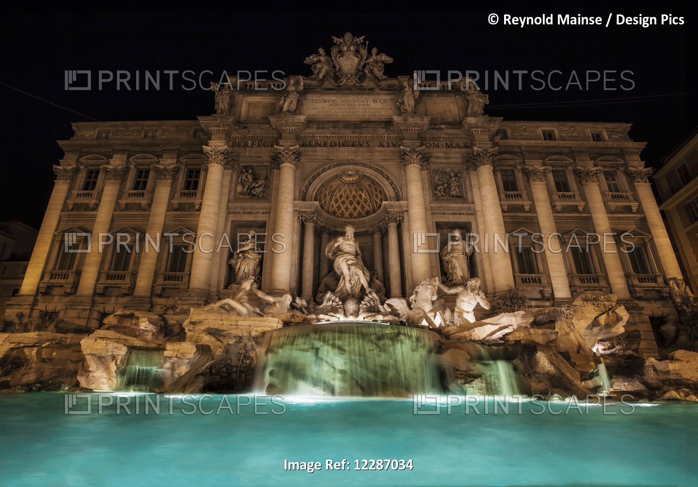 Trevi Fountain Illuminated At Nighttime; Rome, Italy