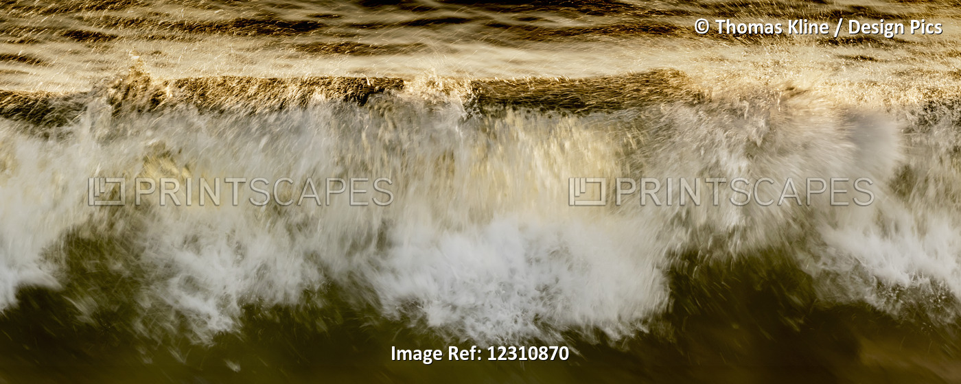 Waves Breaking At The Shore Reflecting Golden Sunlight; Hawaii, United States ...
