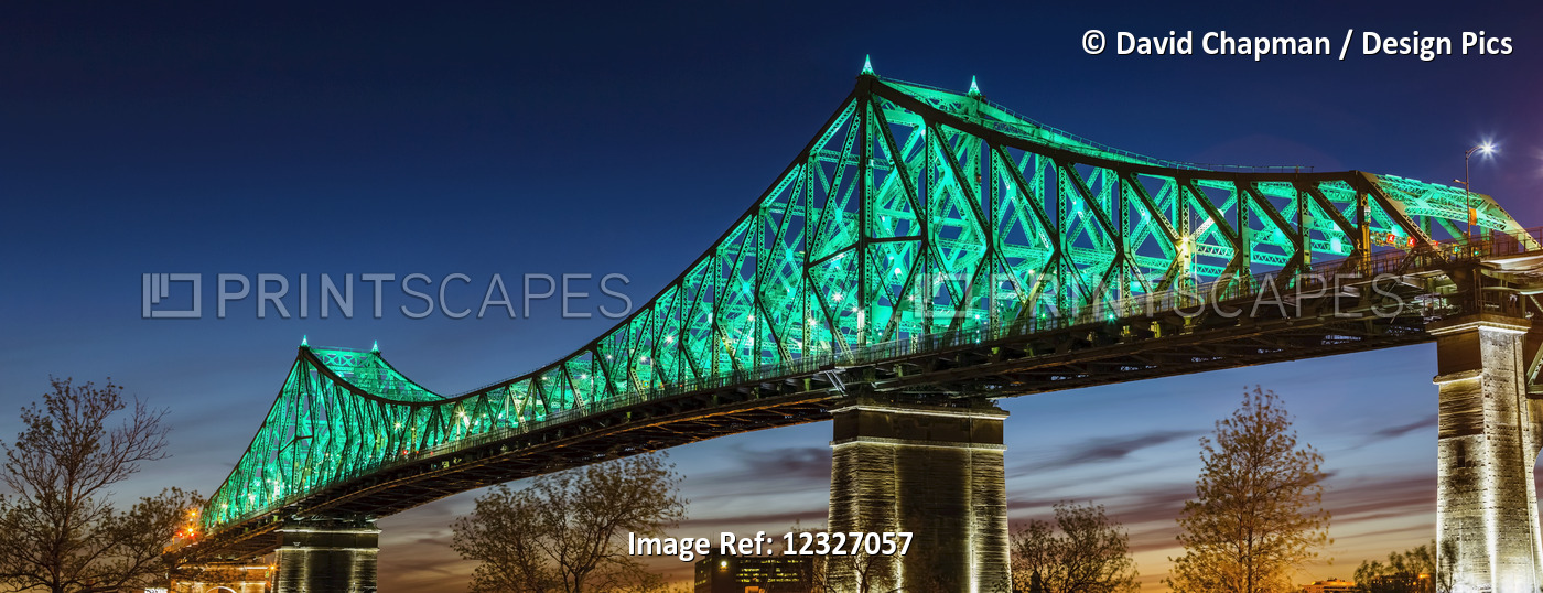 Jacques Bridge illuminated in Spring Green at sunset