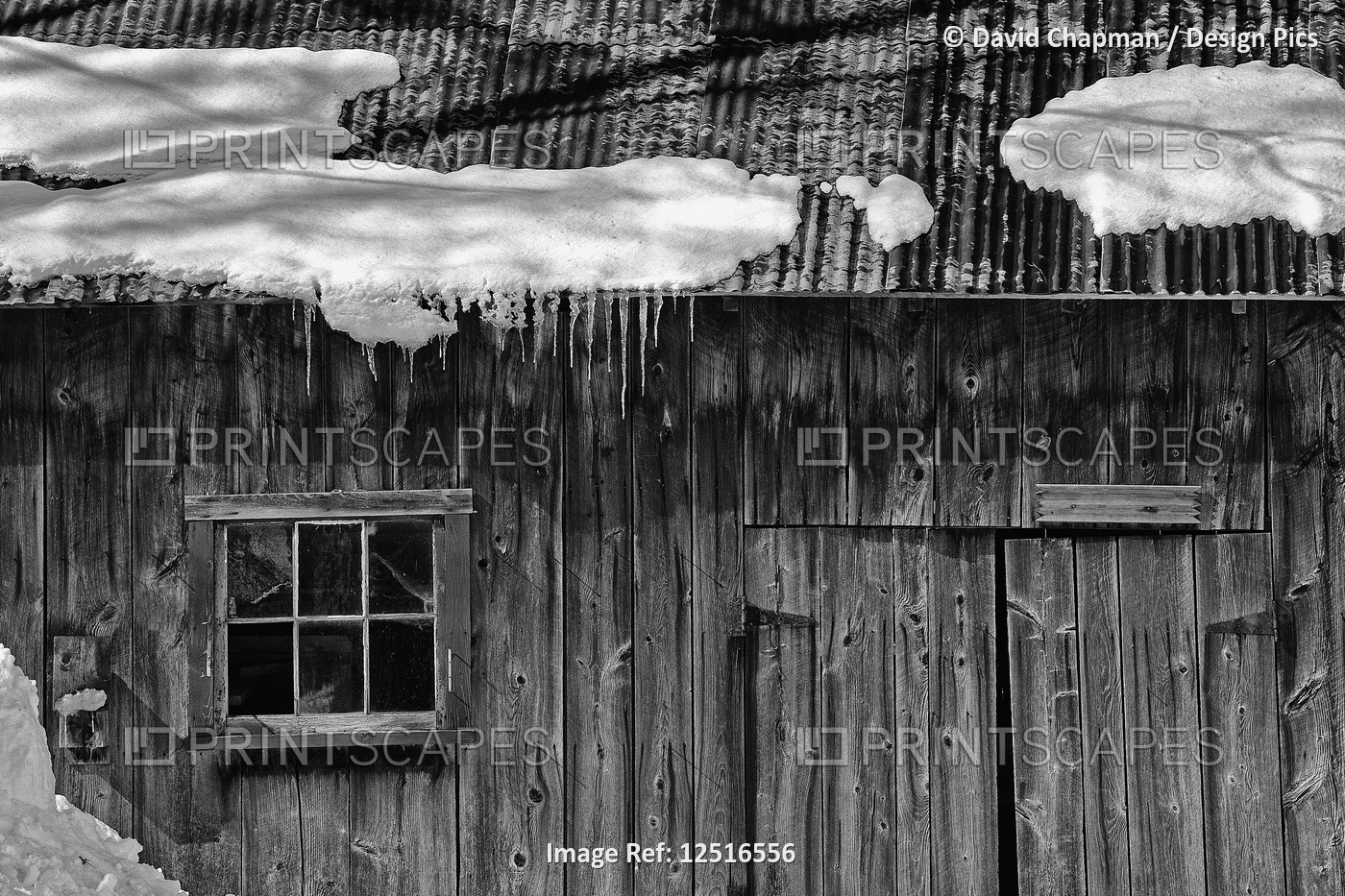 Old wooden shed in winter; Standbridge East, Quebec, Canada