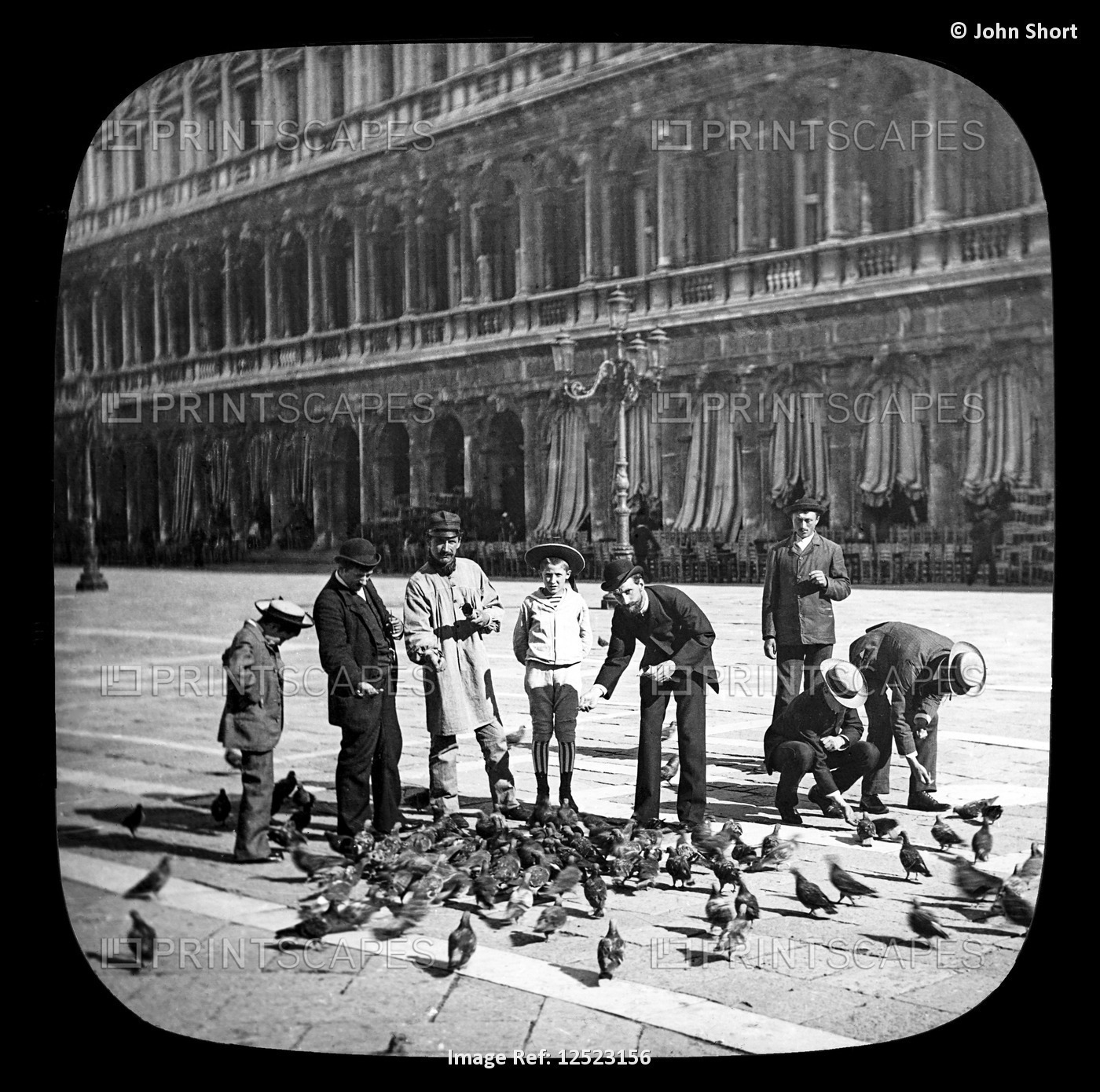Feeding the pigeons in the Piazza of St. Mark's, Venice circa 1900 on a magic ...