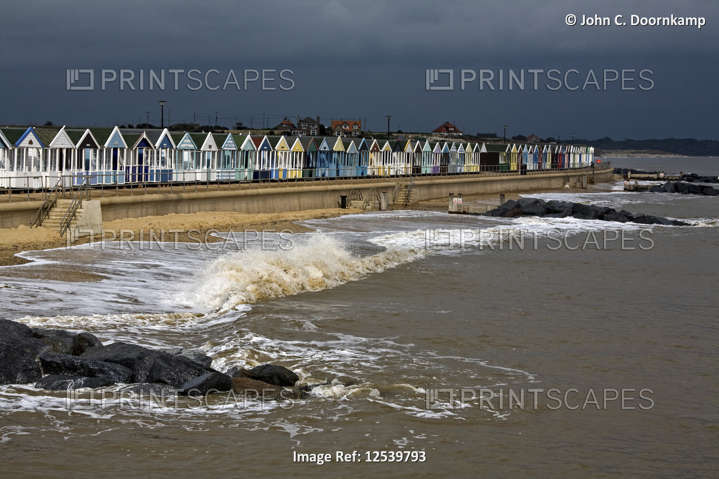 BEACH HUTS IN THE SUNSHINE, SOUTHWOLD, ENGLAND
