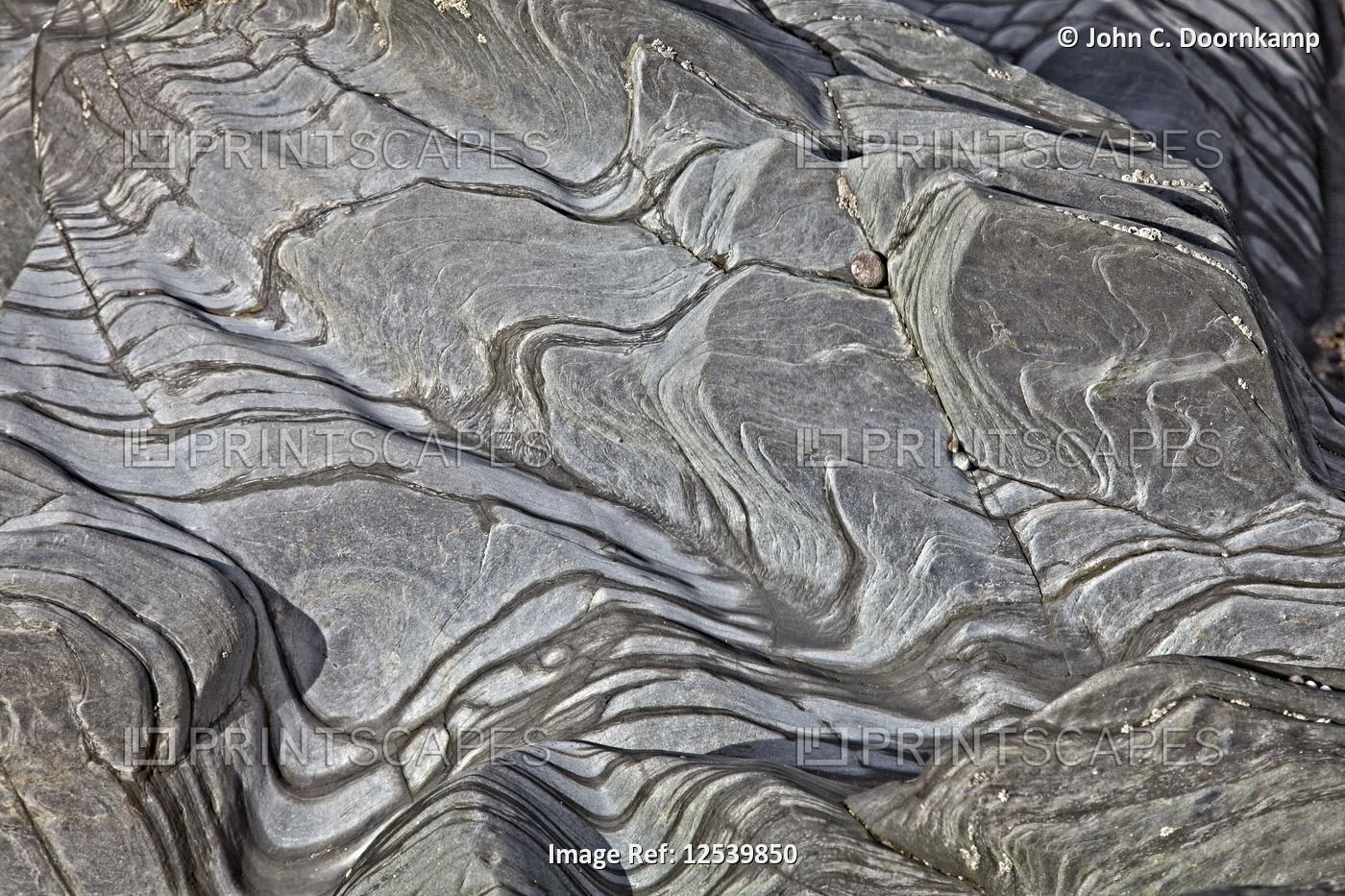 SINUOUS PATTERNS IN A ROCK SURFACE